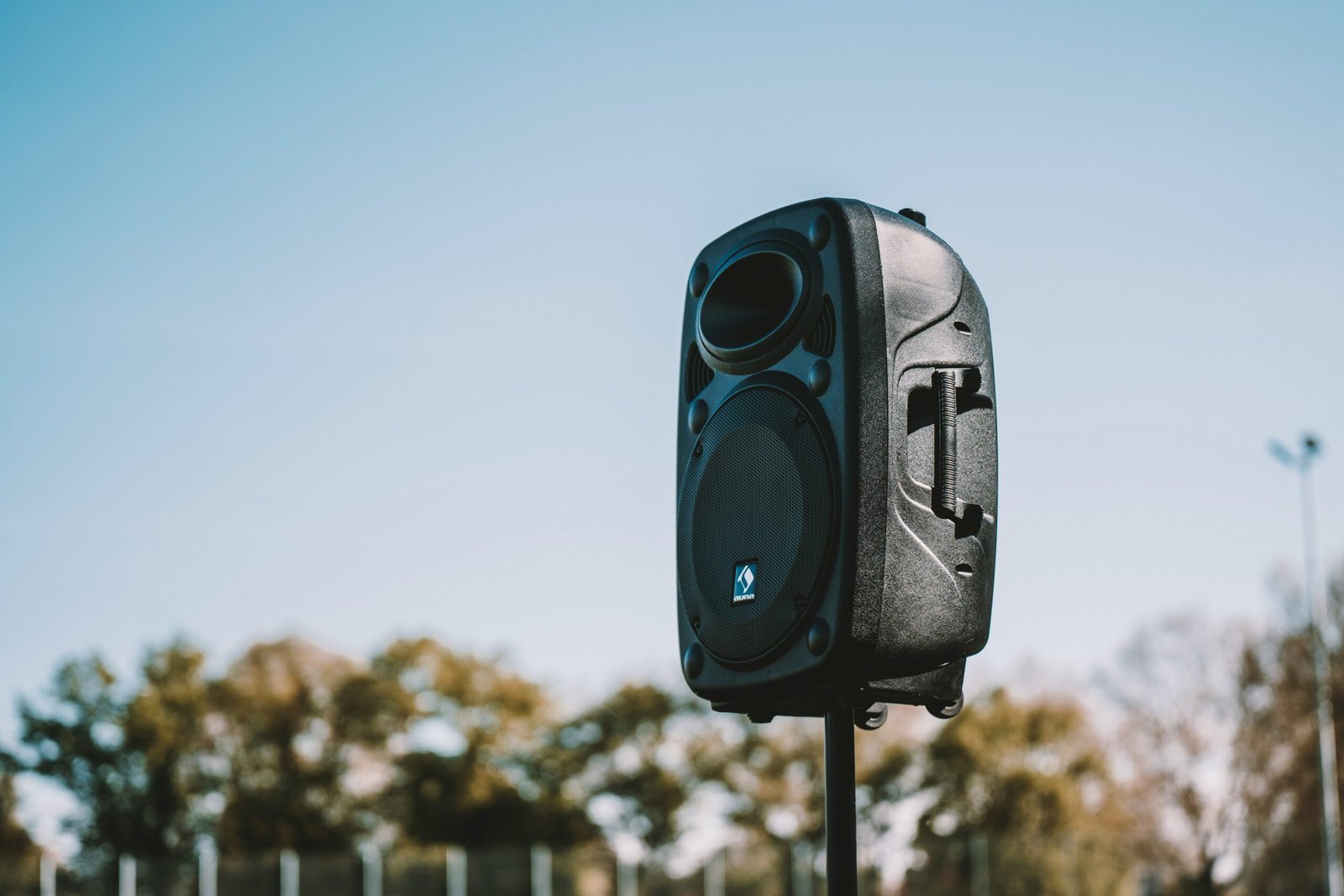 a black and white camera on a pole